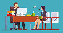 Bürosituation: Frau und Mann am Schreibtisch